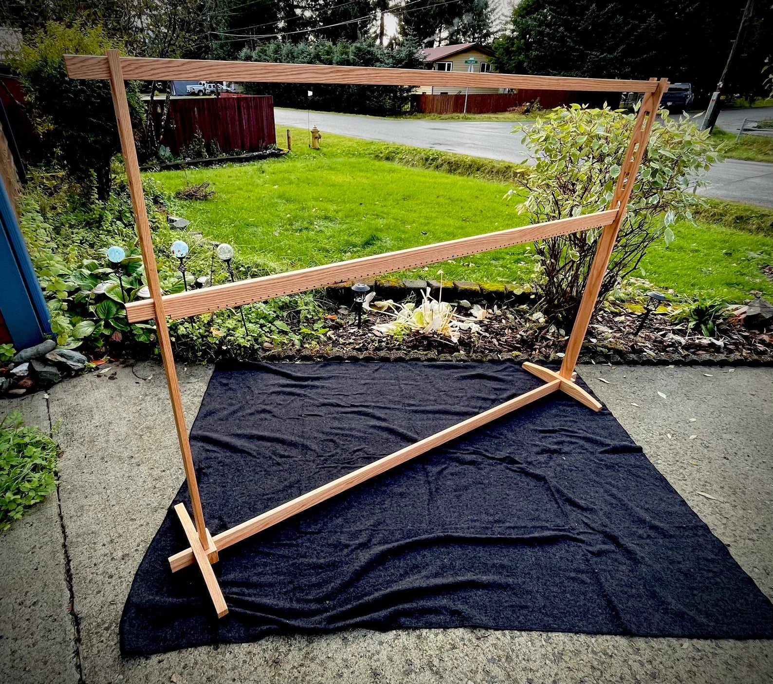 A large wooden weaving loom.