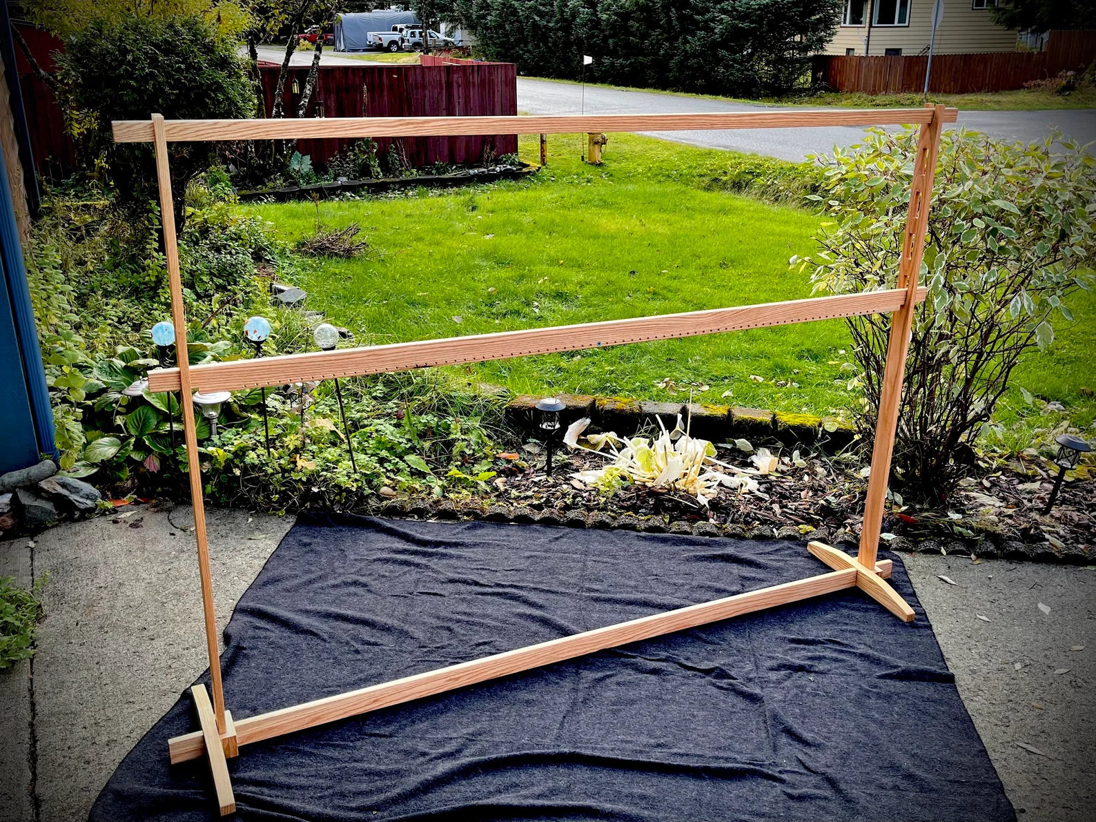 A large wooden weaving loom.