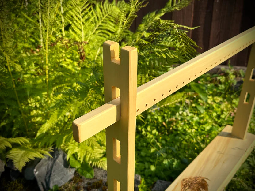 A tabletop weaving loom.